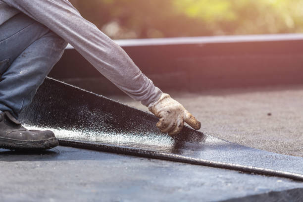 Professional Waterproofing technician working in Kipton, OH